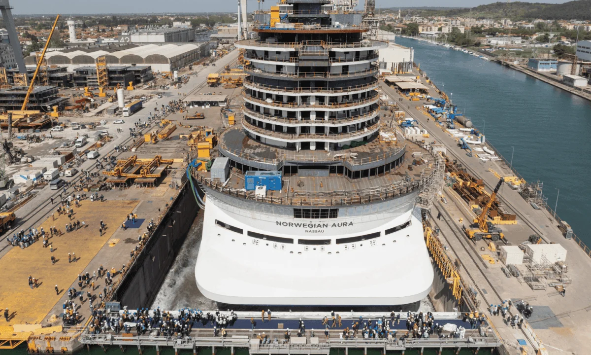 Norwegian Aura Embarks on Historic Journey as Largest Ship in Norwegian Cruise Line Fleet Touches Water for First Time